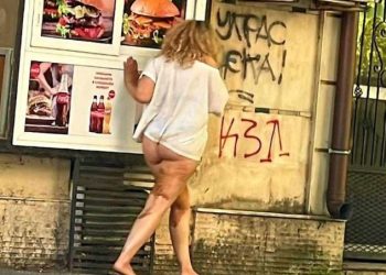Гола общинарка на улицата